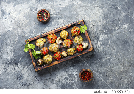 Mushrooms stuffed with vegetables Mushrooms stuffed with vegetables 55835975