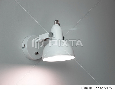 Close-up illuminated metal white electric lamp Close-up illuminated metal white electric lamp 55845475