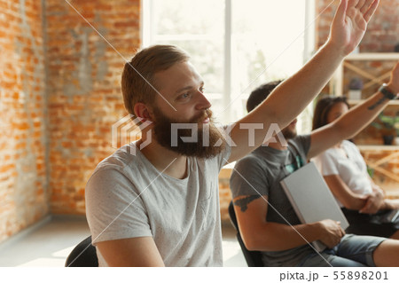 Male speaker giving presentation in hall at university workshop 55898201