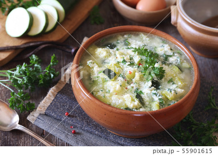 Italian cuisine. Stracciatella zucchini soup Italian cuisine. Stracciatella zucchini soup 55901615