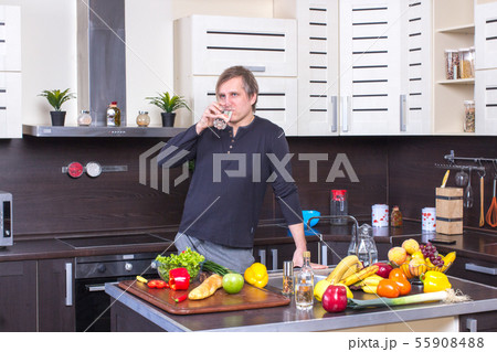 close up of adult man with healthy food at home 55908488