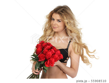 Portrait of young beautiful young woman with set of roses 55908510