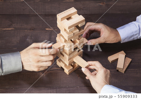 Businessmen Builds a Tower Businessmen Builds a Tower 55909333