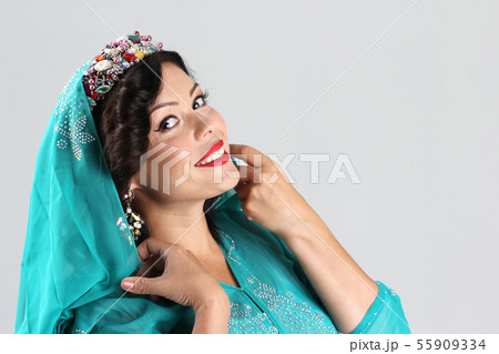 Adult woman in arabian dress Adult woman in arabian dress 55909334
