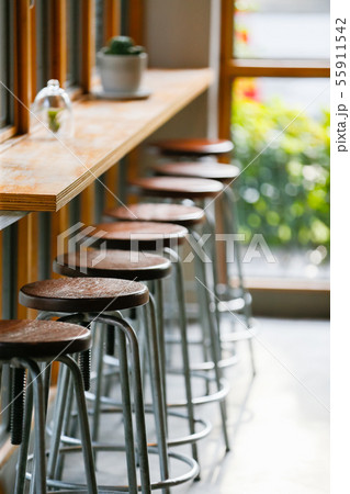Interior of a modern coffee shop with loft style Interior of a modern coffee shop with loft style 55911542