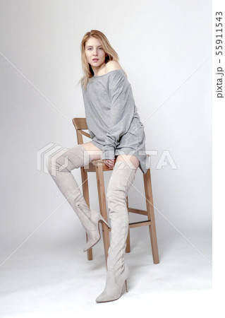 Pretty woman in grey wear 55911543
