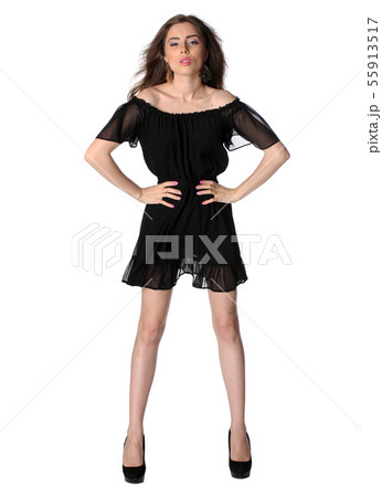 Attractive girl in a little black dress isolated 55913517