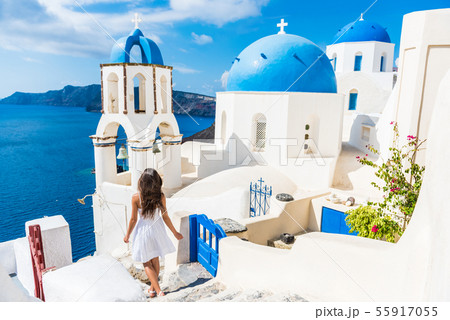 Santorini travel tourist woman on vacation in Oia 55917055