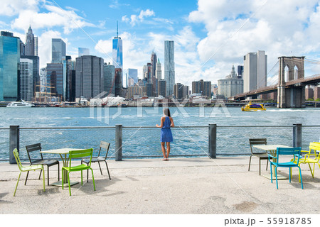New York city skyline waterfront lifestyle - people walking enjoying view 55918785