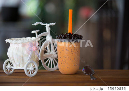 Ice bubble milk tea in takeaway glass. Ice bubble milk tea in takeaway glass. 55920856