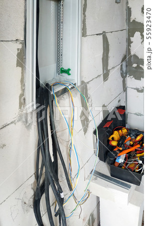 A new electric shield is installed on the wall of A new electric shield is installed on the wall of 55923470