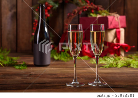 Christmas holiday table with glasses Christmas holiday table with glasses 55923581