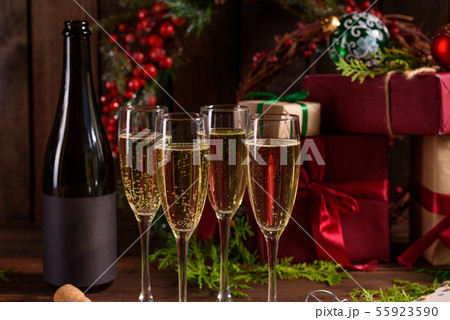 Christmas holiday table with glasses Christmas holiday table with glasses 55923590