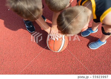 Kids Basketball Team. Young Basketball Players Hol 55923997