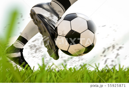 soccer player kicking soccer ball in motion 55925871