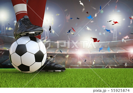 soccer player standing with soccer ball 55925874