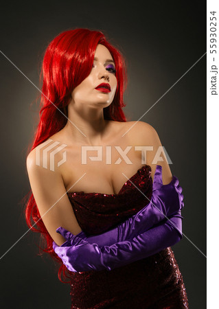 Portrait of an attractive red-haired woman with 55930254