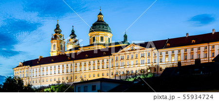 Illuminated Melk Abbey, German: Stift Melk, in the town of Melk by night, Wachau Valley, Austria 55934724