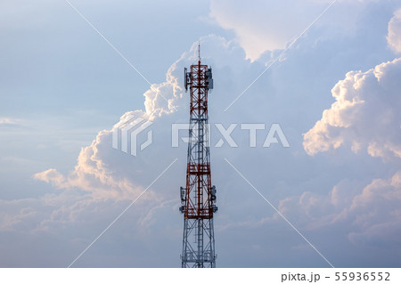 Silhouette signal antenna tower at sunrise sky Silhouette signal antenna tower at sunrise sky 55936552