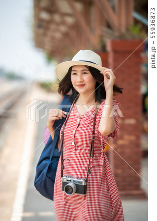 Asian women tourists at the train station. Asian women tourists at the train station. 55936873