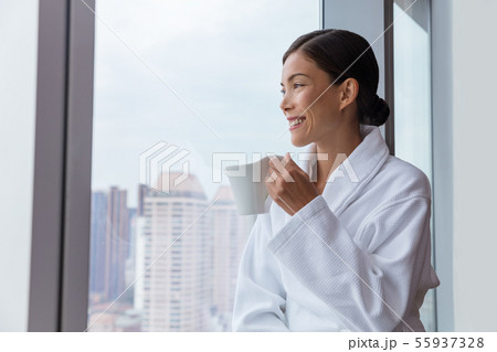 Hotel woman drinking morning coffee relaxing 55937328