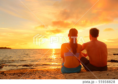 Happy Romantic Couple Enjoying Sunset at Beach Happy Romantic Couple Enjoying Sunset at Beach 55938828