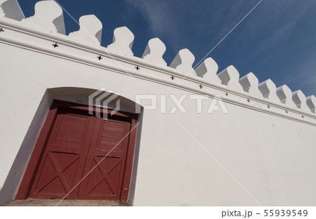 White wall and wood door 55939549