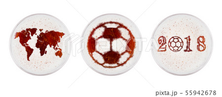 Glasses of red ale beer with world football shape Glasses of red ale beer with world football shape 55942678