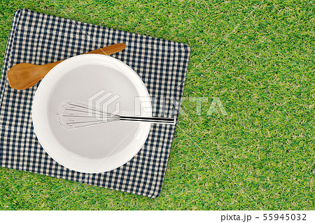 wire whisk in a bowl 55945032