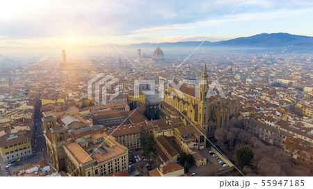 AERIAL. Panorama of the city of FLORENCE in Italy with the dome and Palazzo della Signoria and arno 55947185