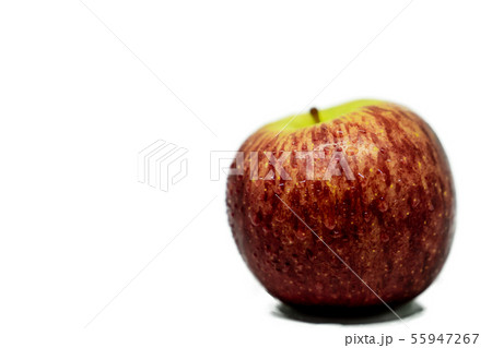 A Red apple with drops isolated on white 55947267