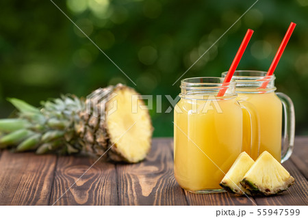 pineapple juice in mason jars 55947599