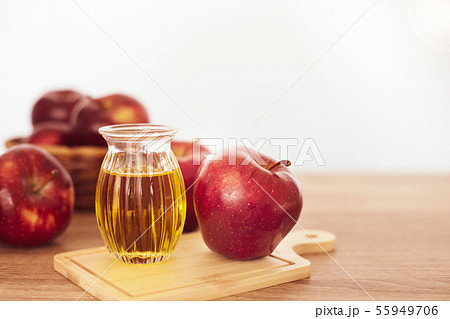 Close up red Apple fruit  and apple cider vinegar 55949706