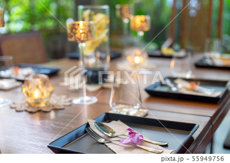 Dinner set on the wood table with long wine glass 55949756
