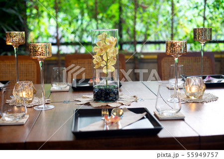 Dinner set on the wood table with long wine glass 55949757