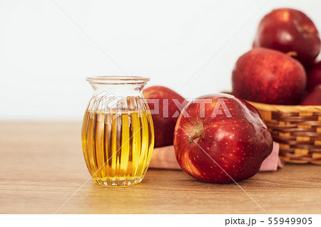 Close up red Apple fruit  and apple cider vinegar 55949905