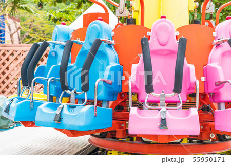 Colorful roller coaster seats at amusement park 55950171