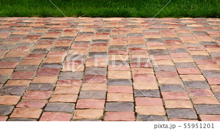 Pavement of square red and brown tiles Pavement of square red and brown tiles 55951201