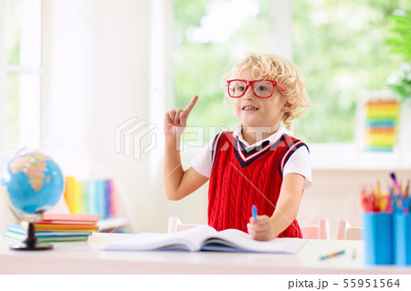 Kids doing homework. Children go back to school. Kids doing homework. Children go back to school. 55951564