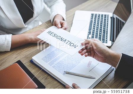 Businessman sending a resignation letter to 55951738