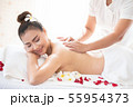 Asian women are undergoing a salt scrub massage 55954373