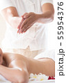 Asian women are undergoing a salt scrub massage 55954376