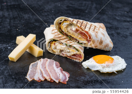 Shawarma sandwich gyroscope fresh roll of lavash Lavash chicken beef Shawarma falafel recipe tin Shawarma sandwich gyroscope fresh roll of lavash Lavash chicken beef Shawarma falafel recipe tin 55954426