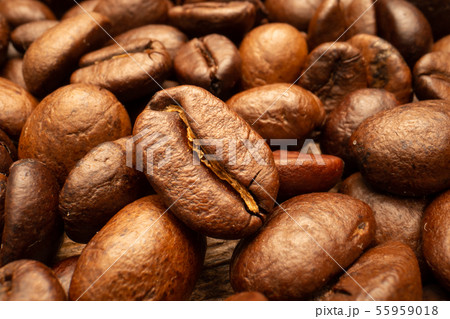 Very big roasted brown coffee beans background Very big roasted brown coffee beans background 55959018