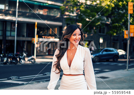 portrait of young stylish asian girl on the street of big modern city portrait of young stylish asian girl on the street of big modern city 55959548