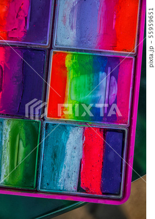 purple green, pink, blue paint colored face painting 55959651