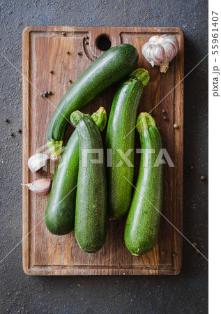 Fresh organic zucchini, garlic and parsley, herbs Fresh organic zucchini, garlic and parsley, herbs 55961407