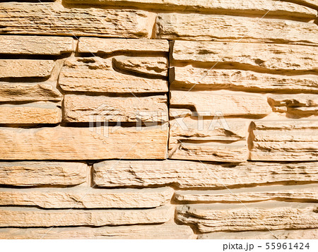 Orange ruined brick wall photo background 55961424