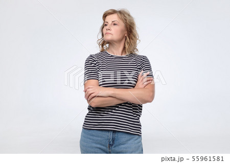 Mature woman with proud and arrogant emotion. Mature woman with proud and arrogant emotion. 55961581