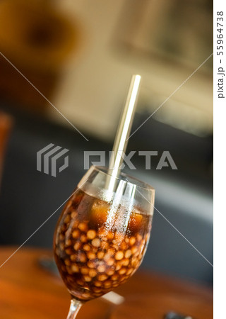 pearl milk tea on glass with stainless steel straw 55964738